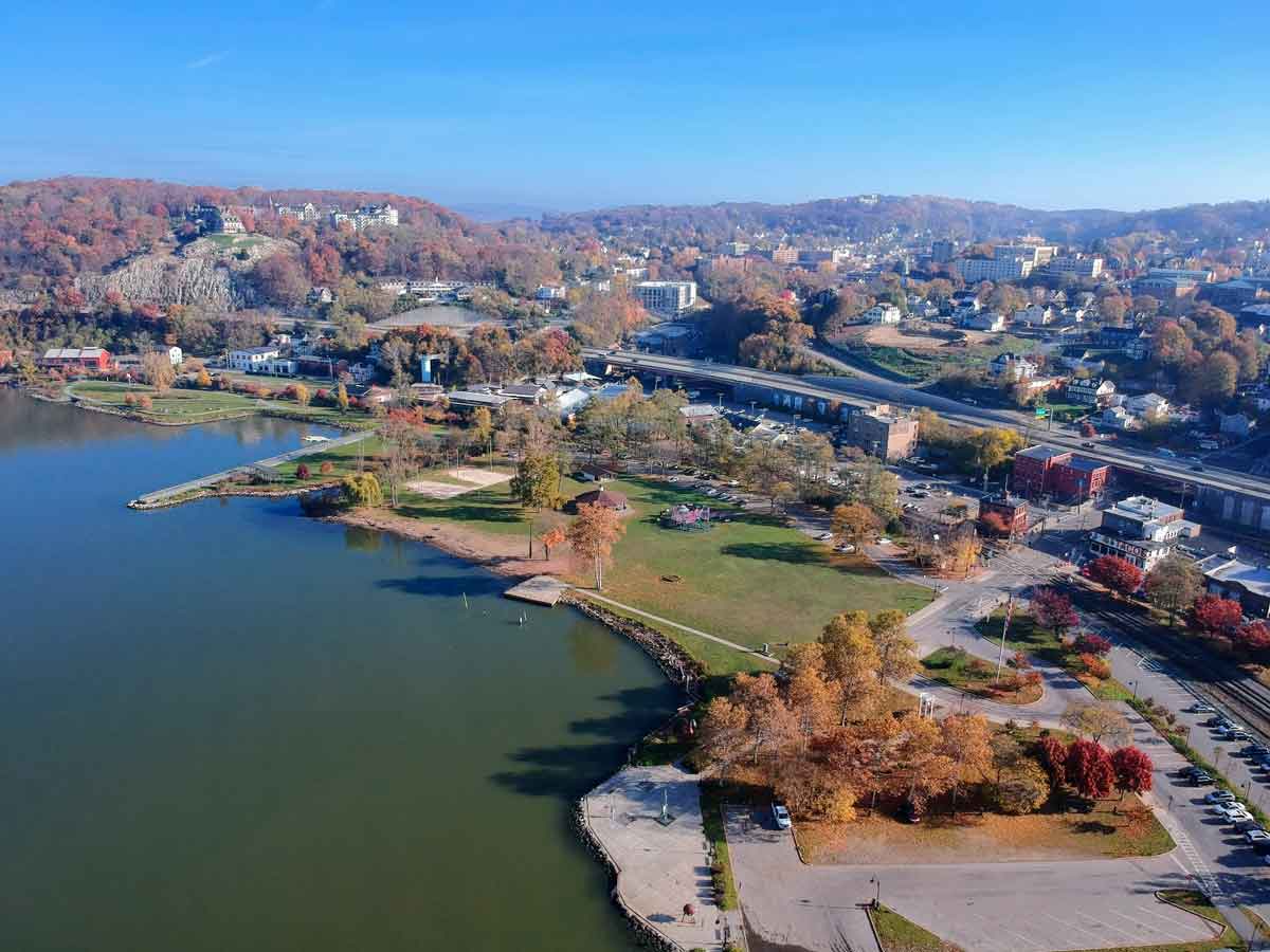 The Historic Peekskill Waterfront seen from a drone's point of view on a cloudless autumn day.